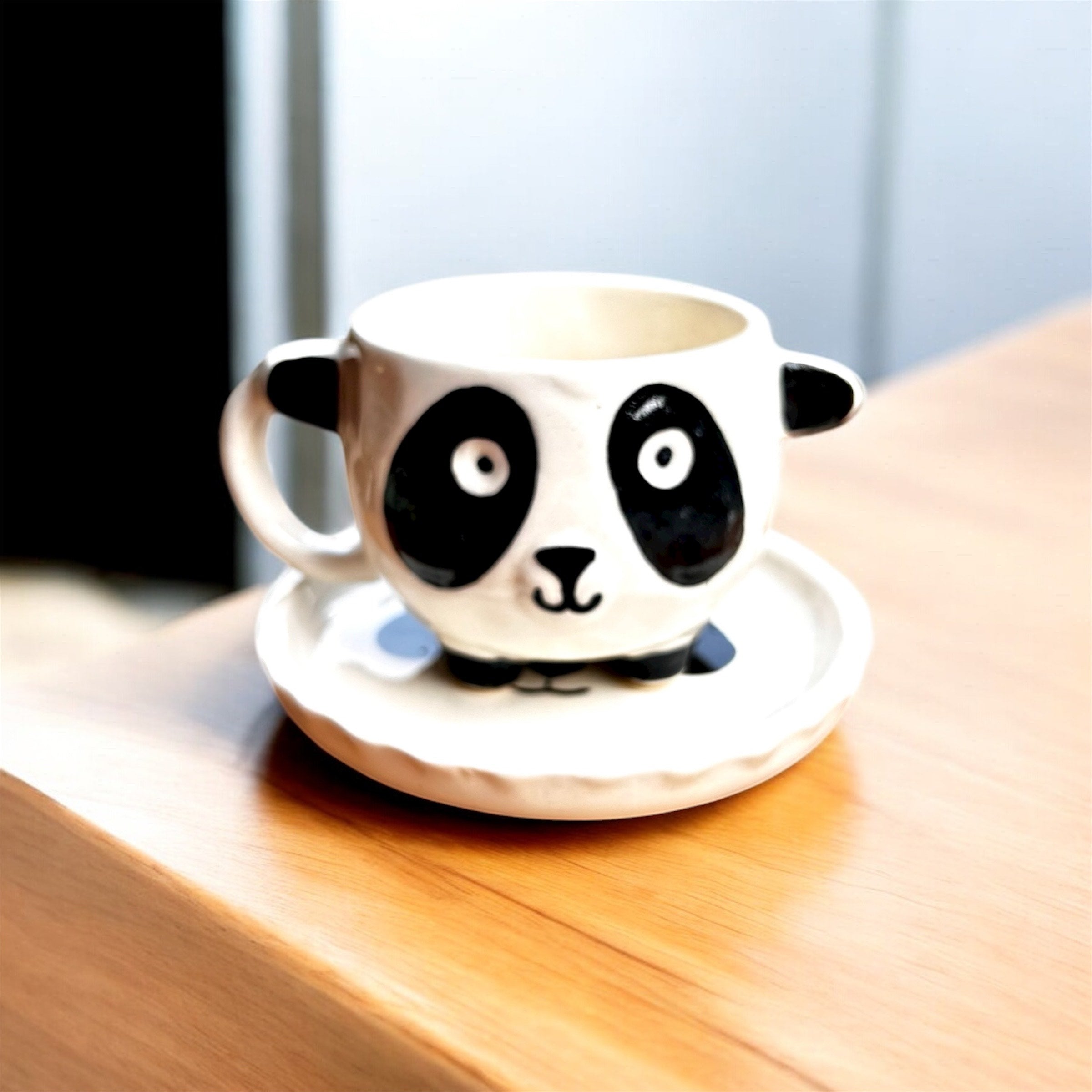 The Clear Clay Panda Ceramic Mug with Saucer set